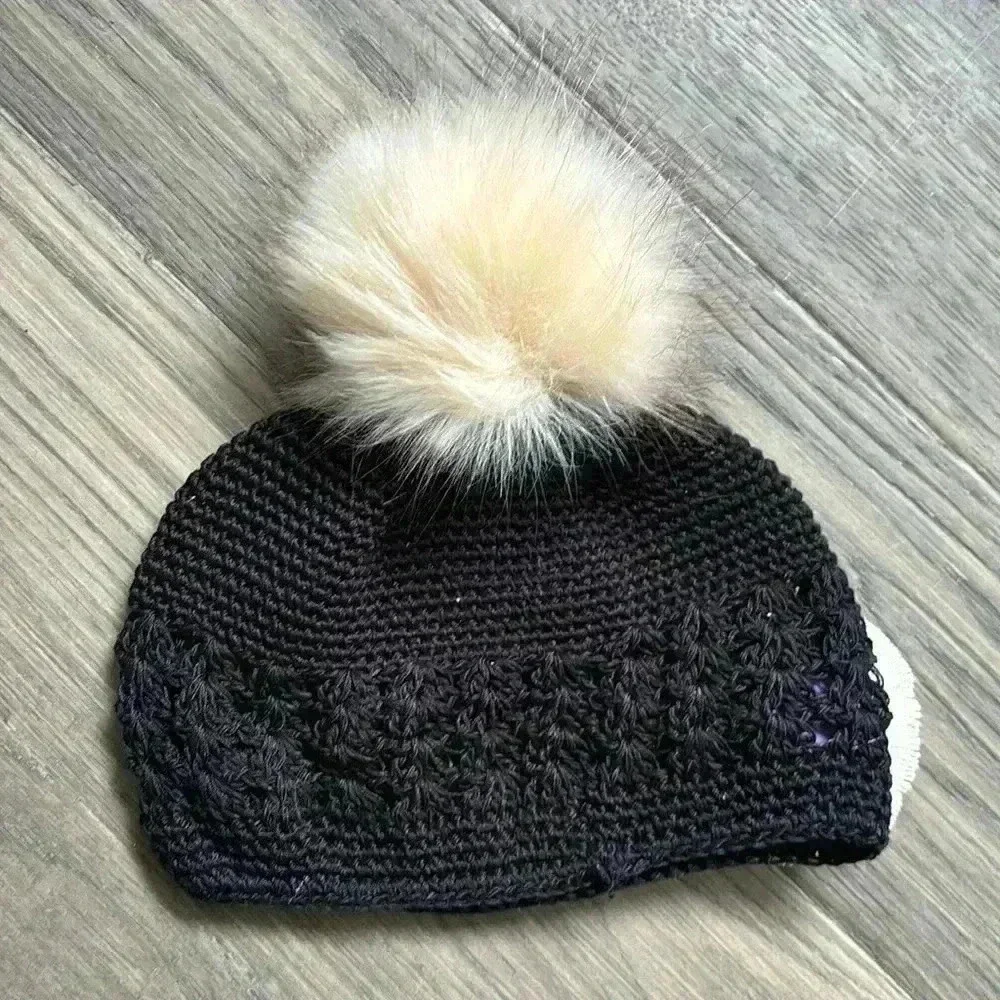 Hand crafted black crochet girls hat with flower and fuzzy pom pom - Picture 8 of 9